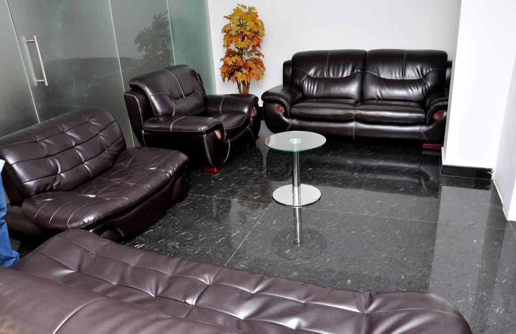 Hotel The Home Tiruppur Zimmer foto